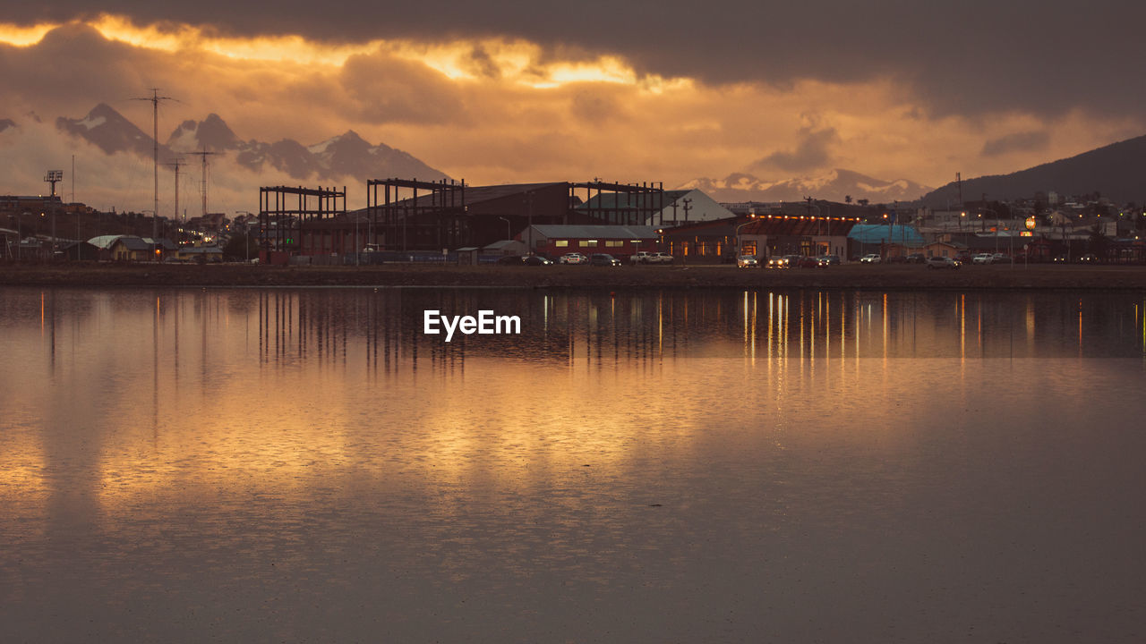 Scenic view of lake against sky during sunset