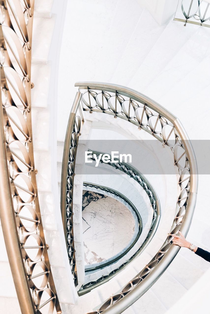 LOW ANGLE VIEW OF SPIRAL STAIRS