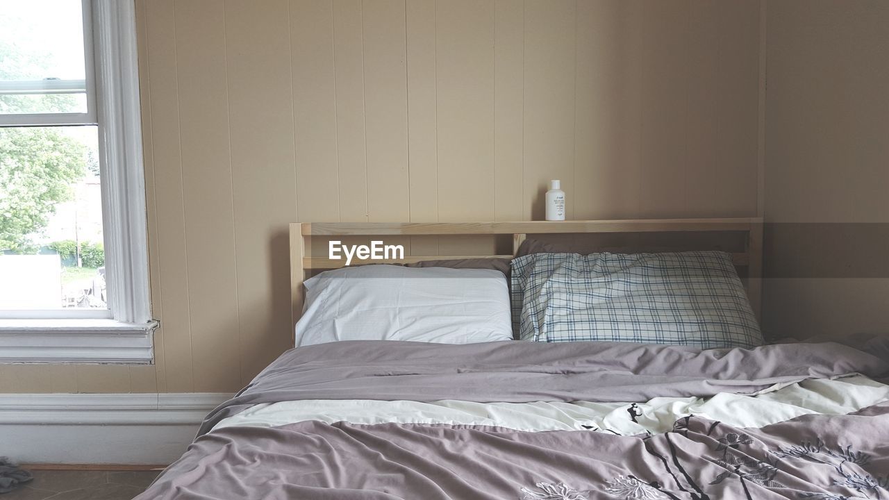 Pillows on bed in bedroom