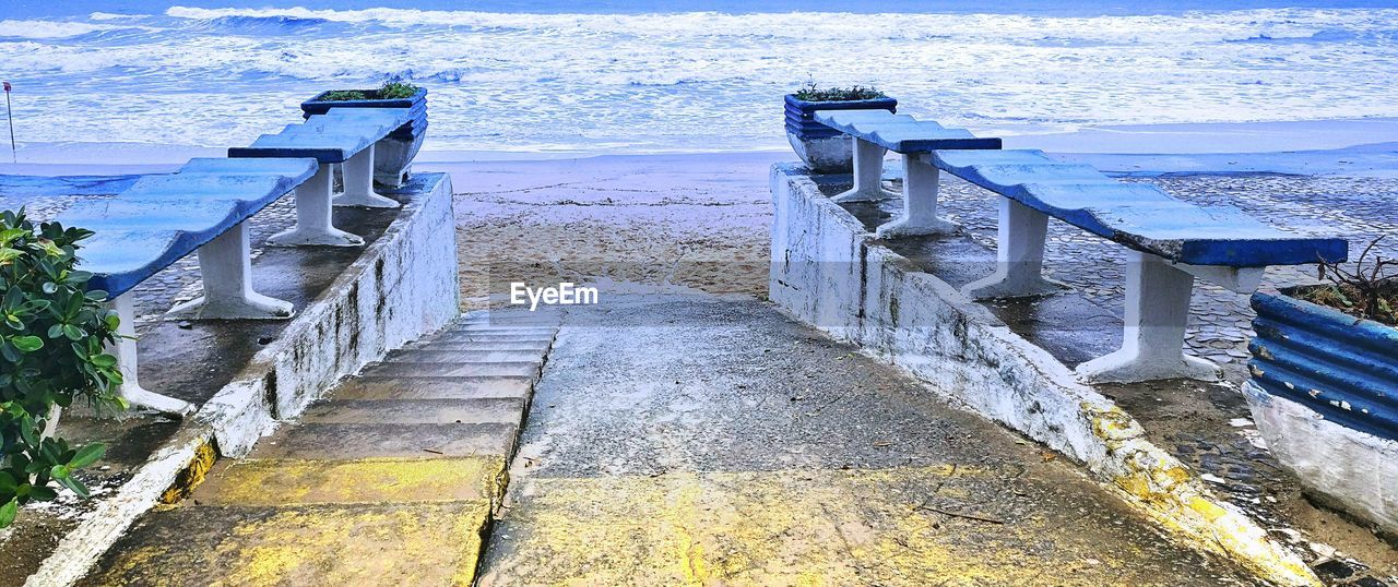 High angle view of steps leading towards beach