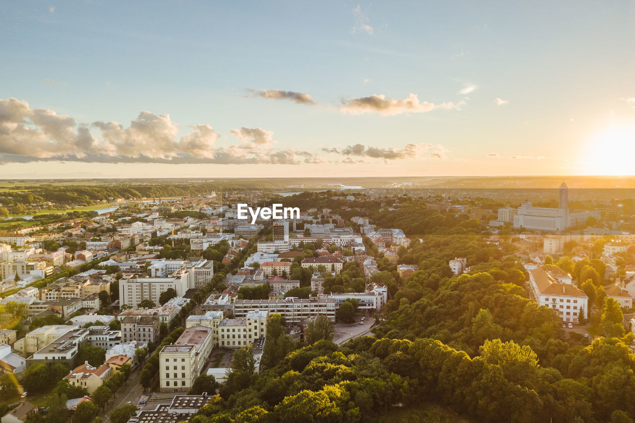 High angle view of cityscape against sky at sunset