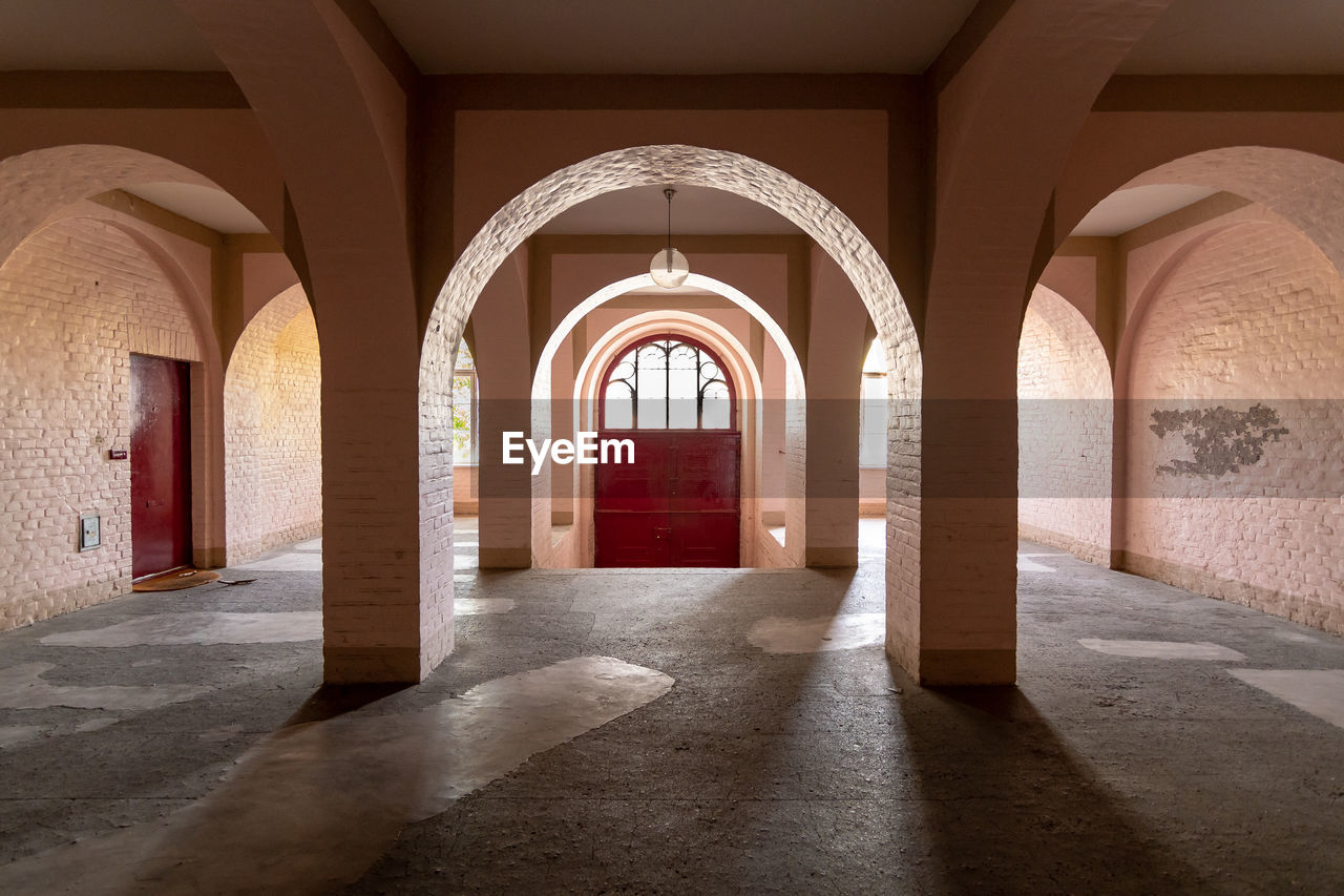 CORRIDOR OF BUILDING WITH COLONNADE