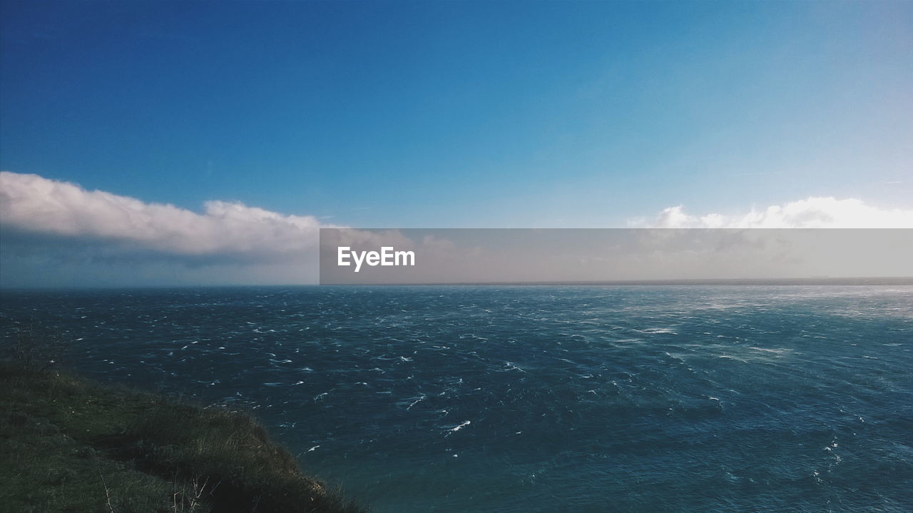 Tranquil view of sea against sky