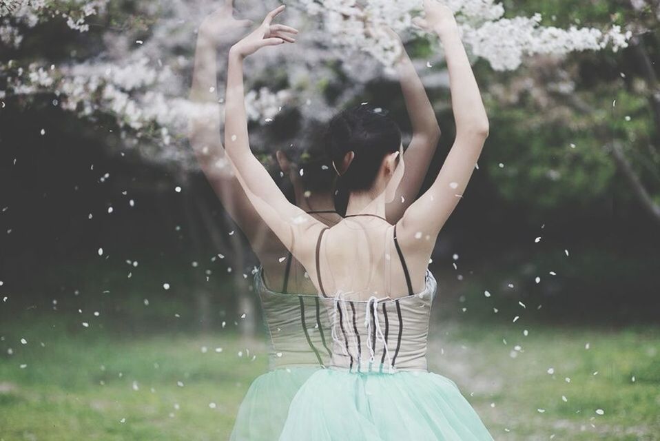 WOMAN STANDING IN WATER