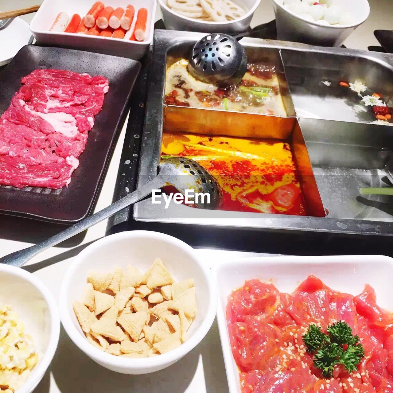 CLOSE-UP OF SERVED FOOD ON TABLE