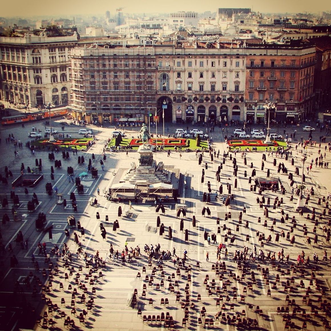 Chairs on town square in city