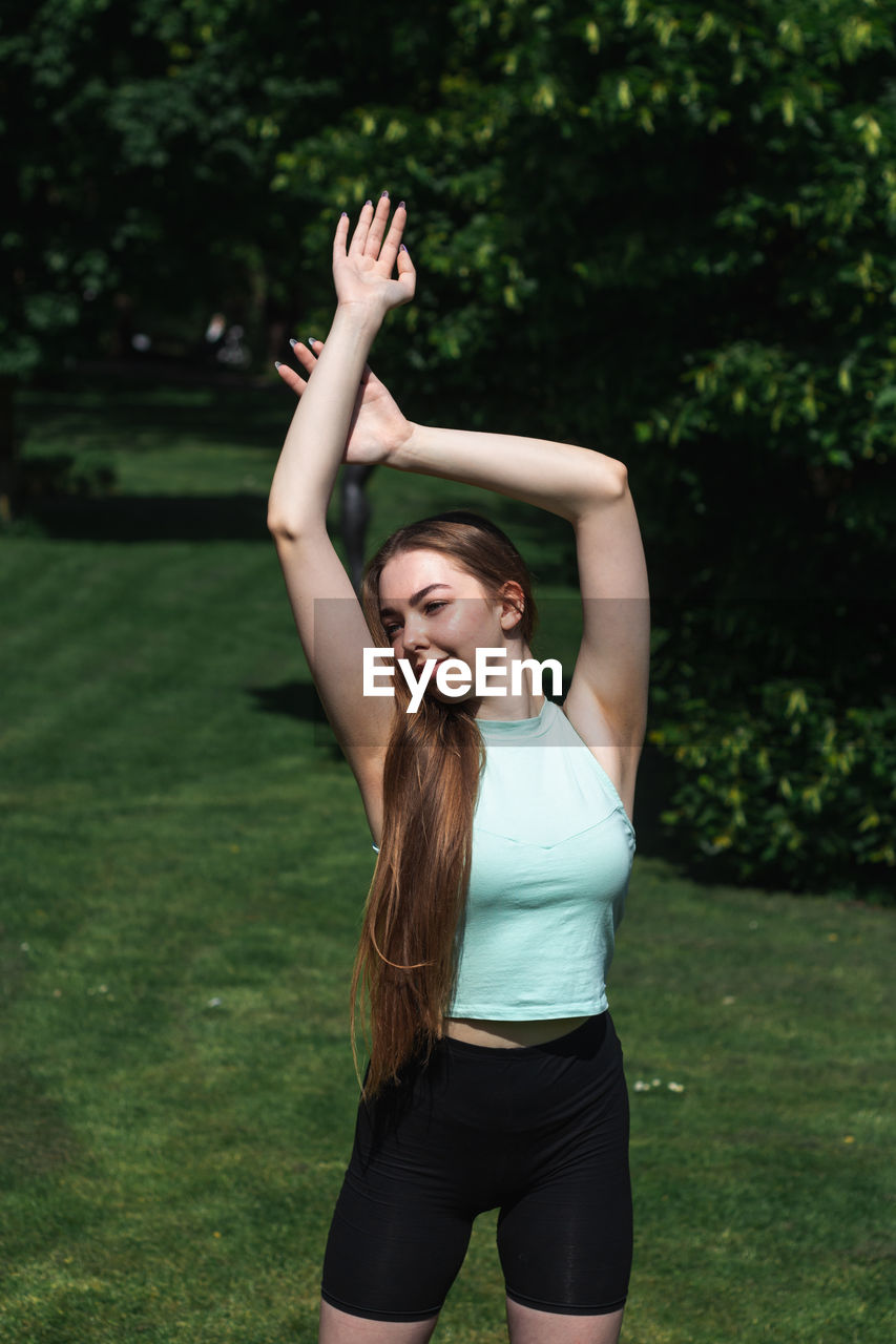 Woman exercising in park