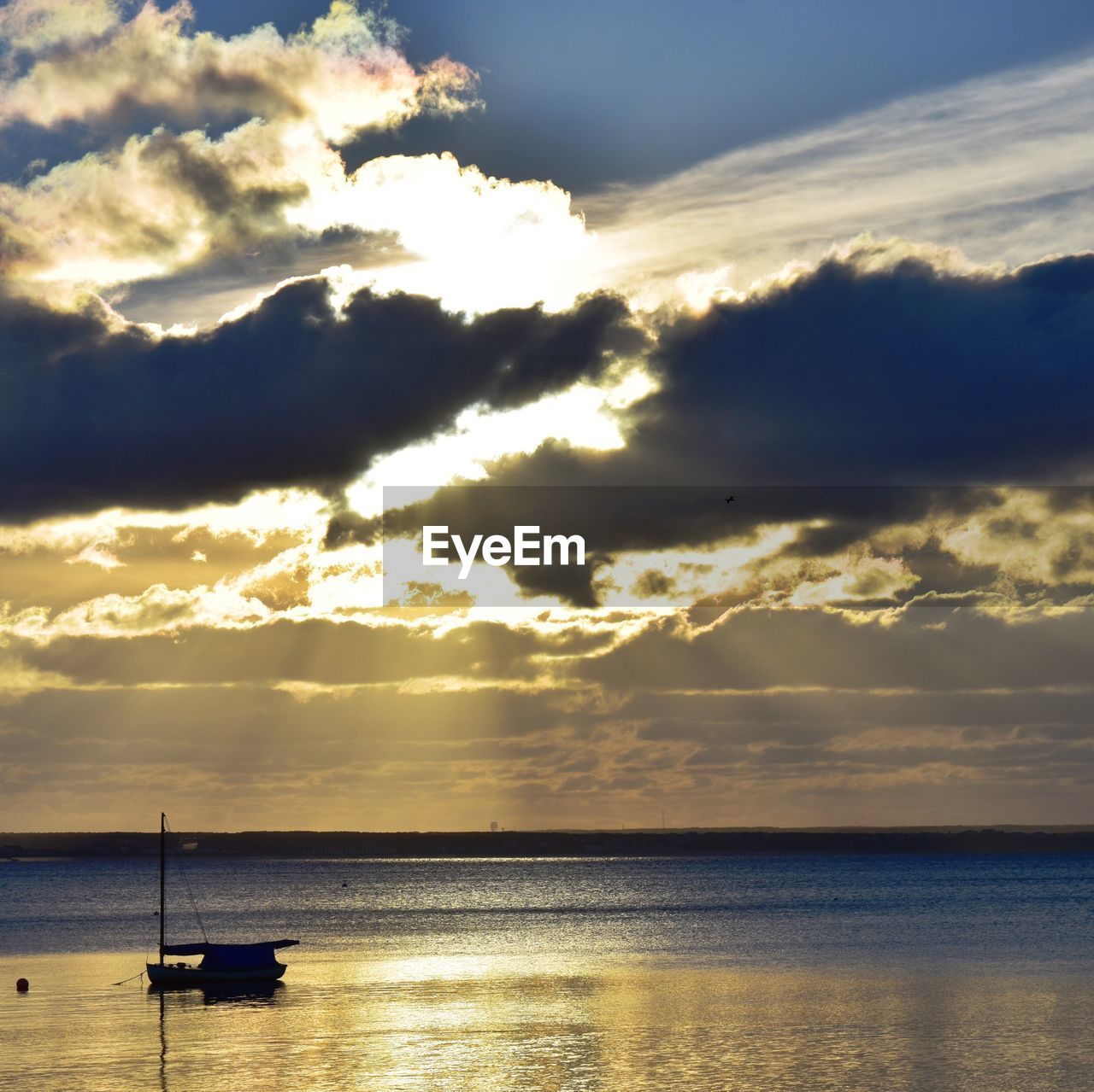 Scenic view of seascape against cloudy sky