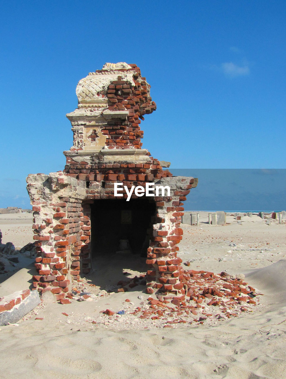 View of historical building against clear blue sky