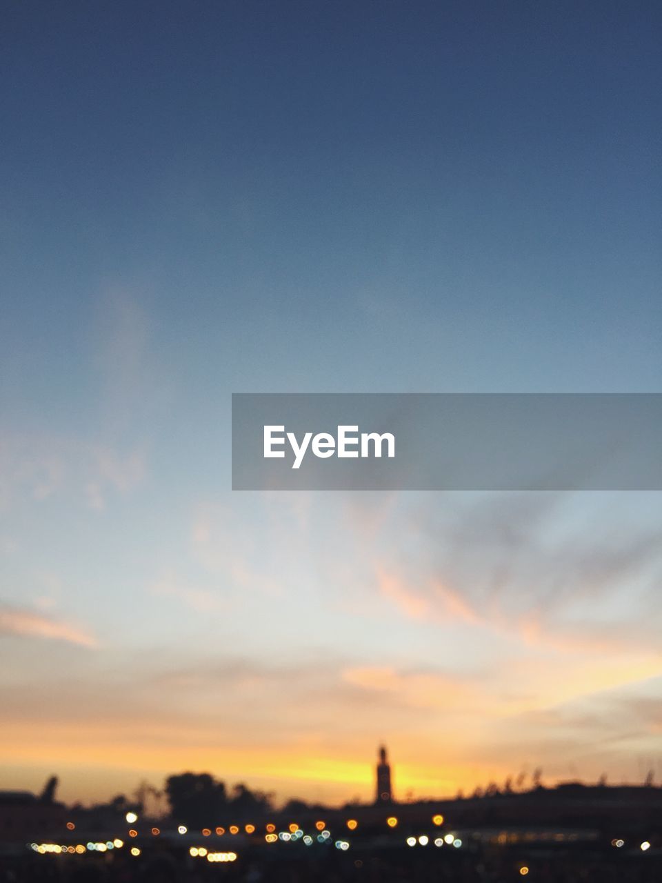 SILHOUETTE OF CITY AT SUNSET