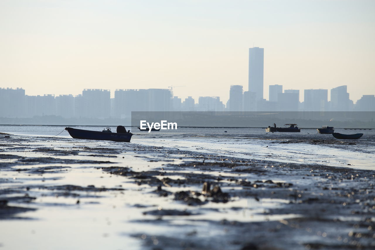 Boat in sea against clear sky