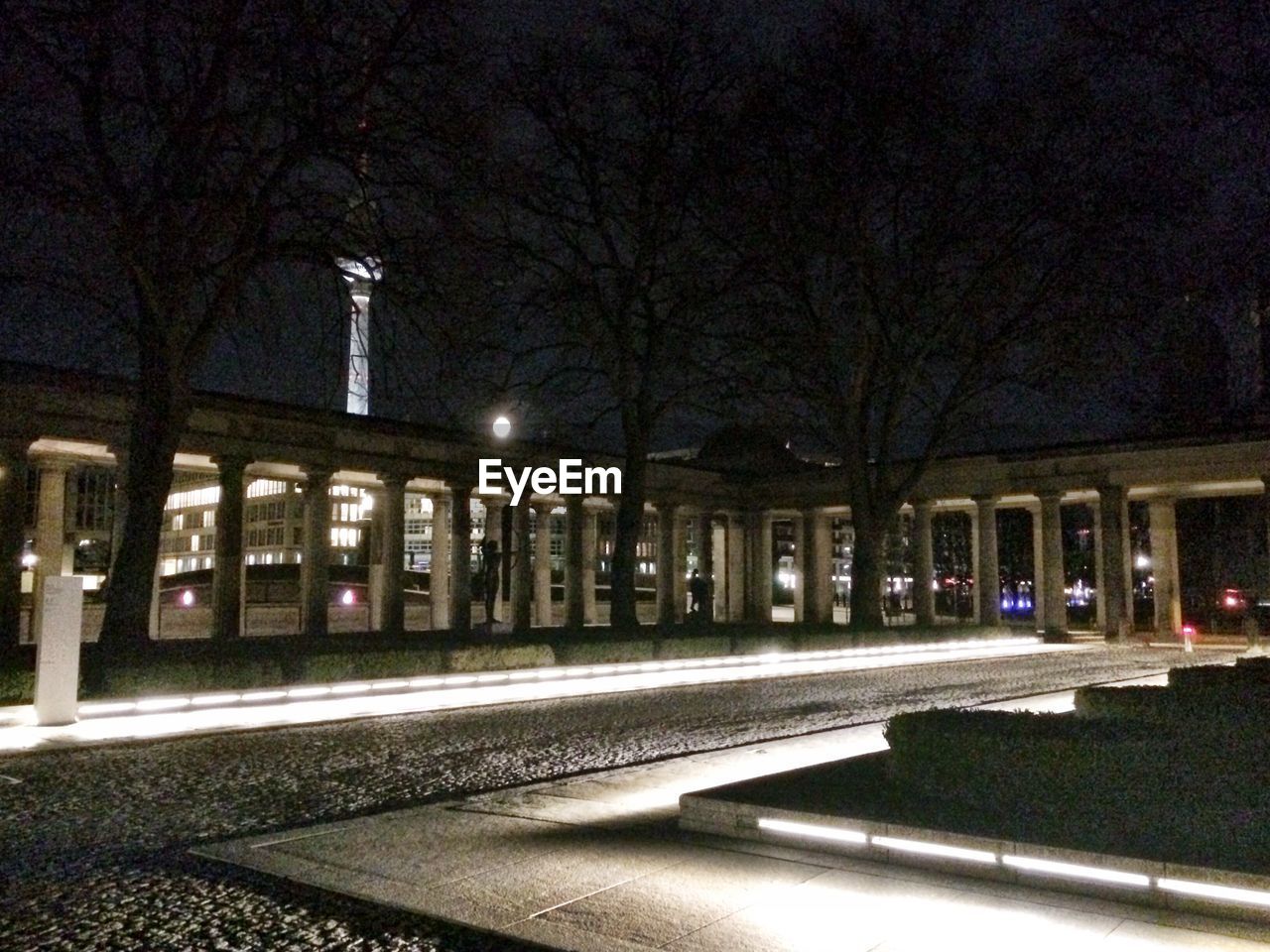 VIEW OF ILLUMINATED BUILDINGS AT NIGHT