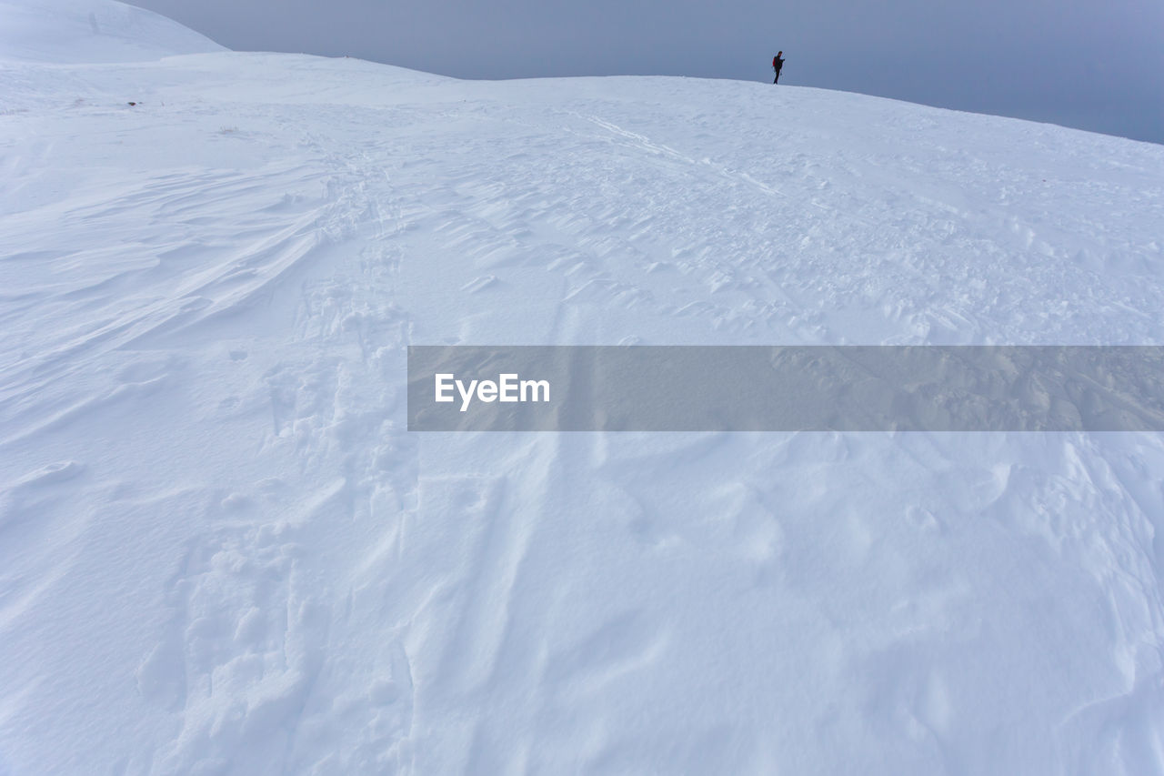 VIEW OF SNOW COVERED LAND