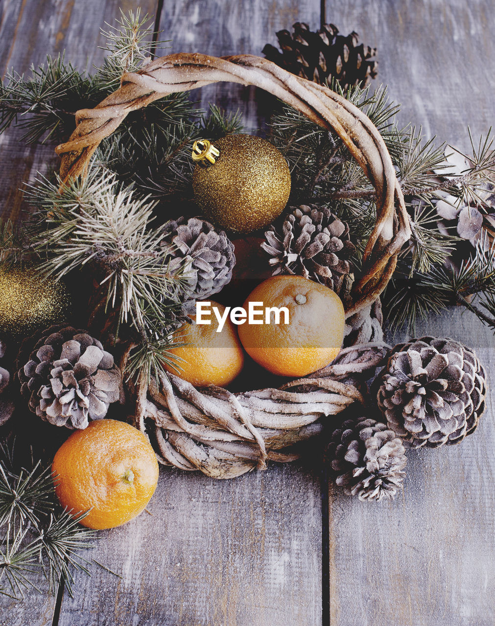 HIGH ANGLE VIEW OF PUMPKINS IN BASKET