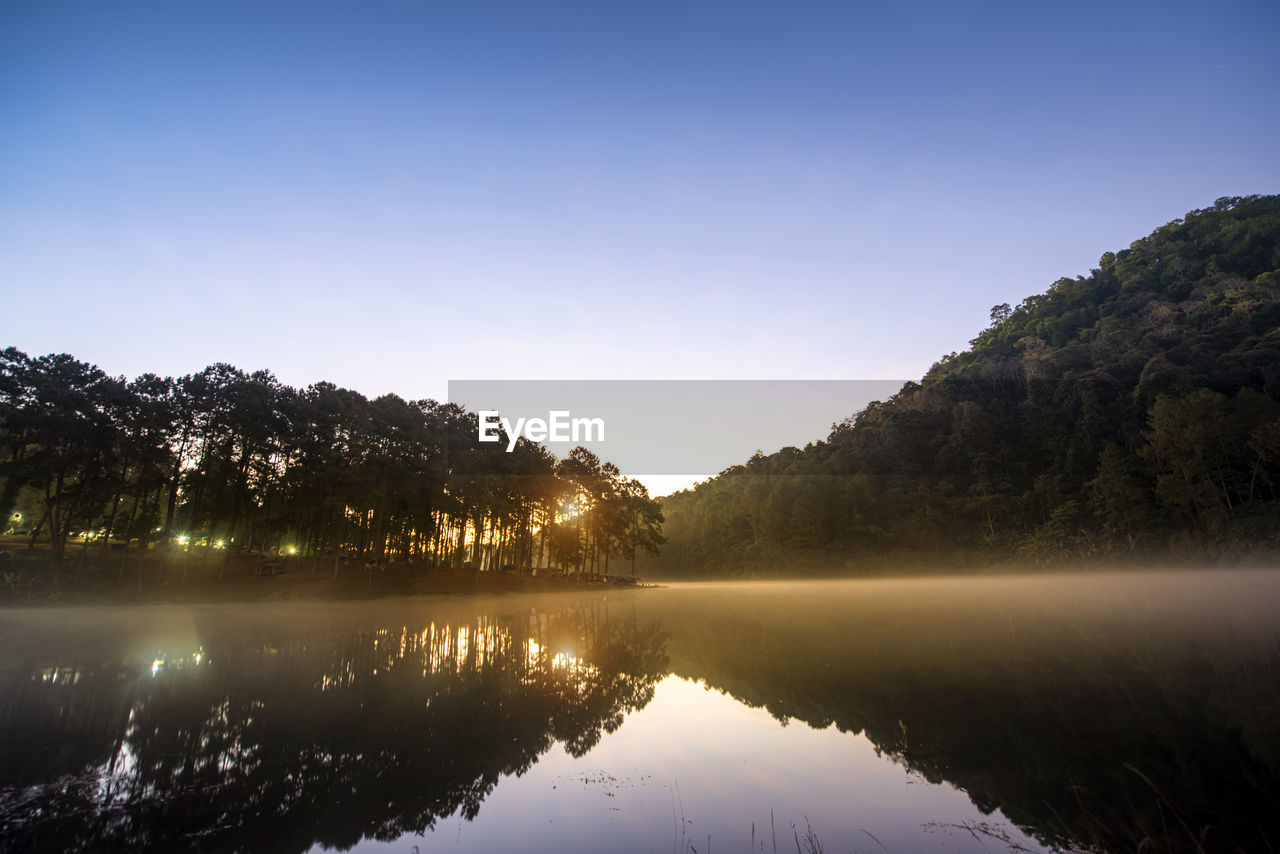 In the morning, a small village on a valley in the north of thailand.