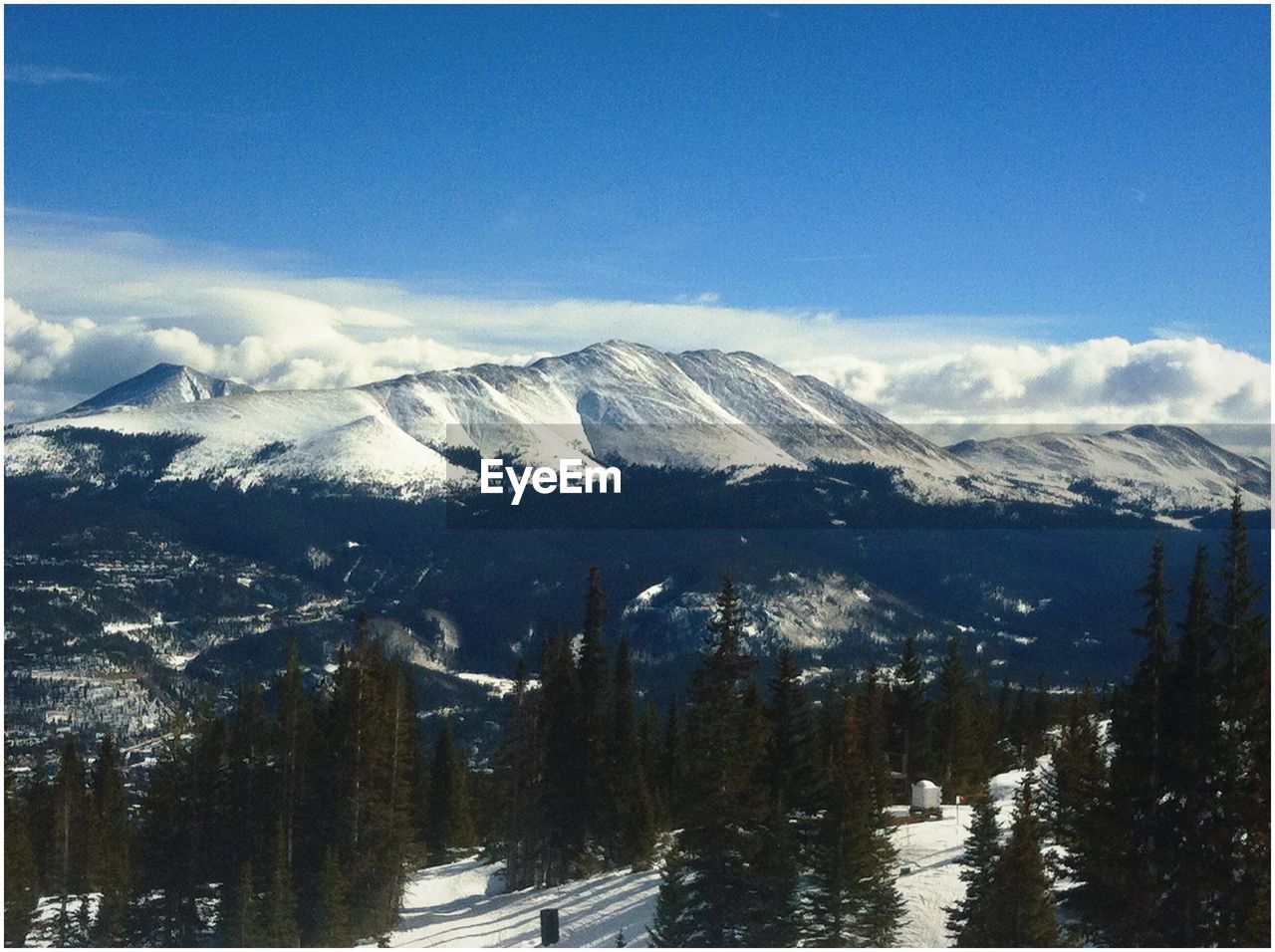 Scenic view of mountains against sky during winter