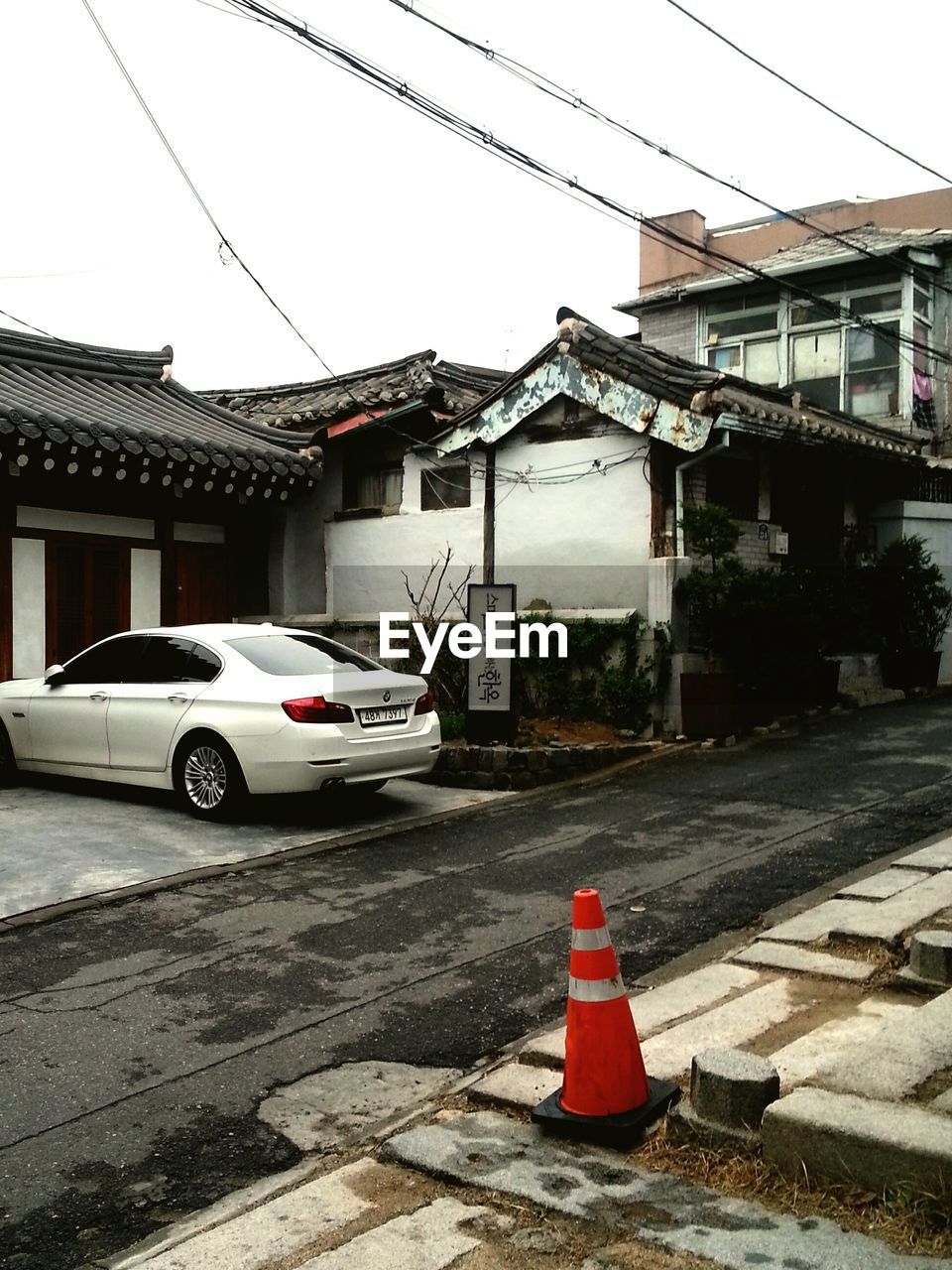 ROAD WITH BUILDINGS IN BACKGROUND