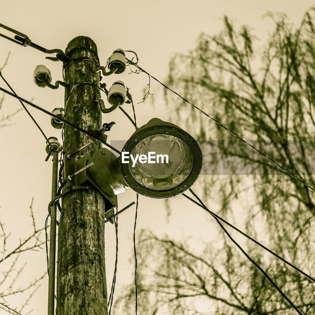 LOW ANGLE VIEW OF POWER LINES AGAINST SKY