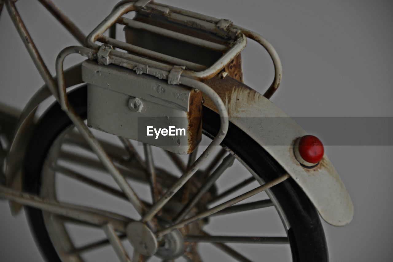 Close-up of bicycle against white background