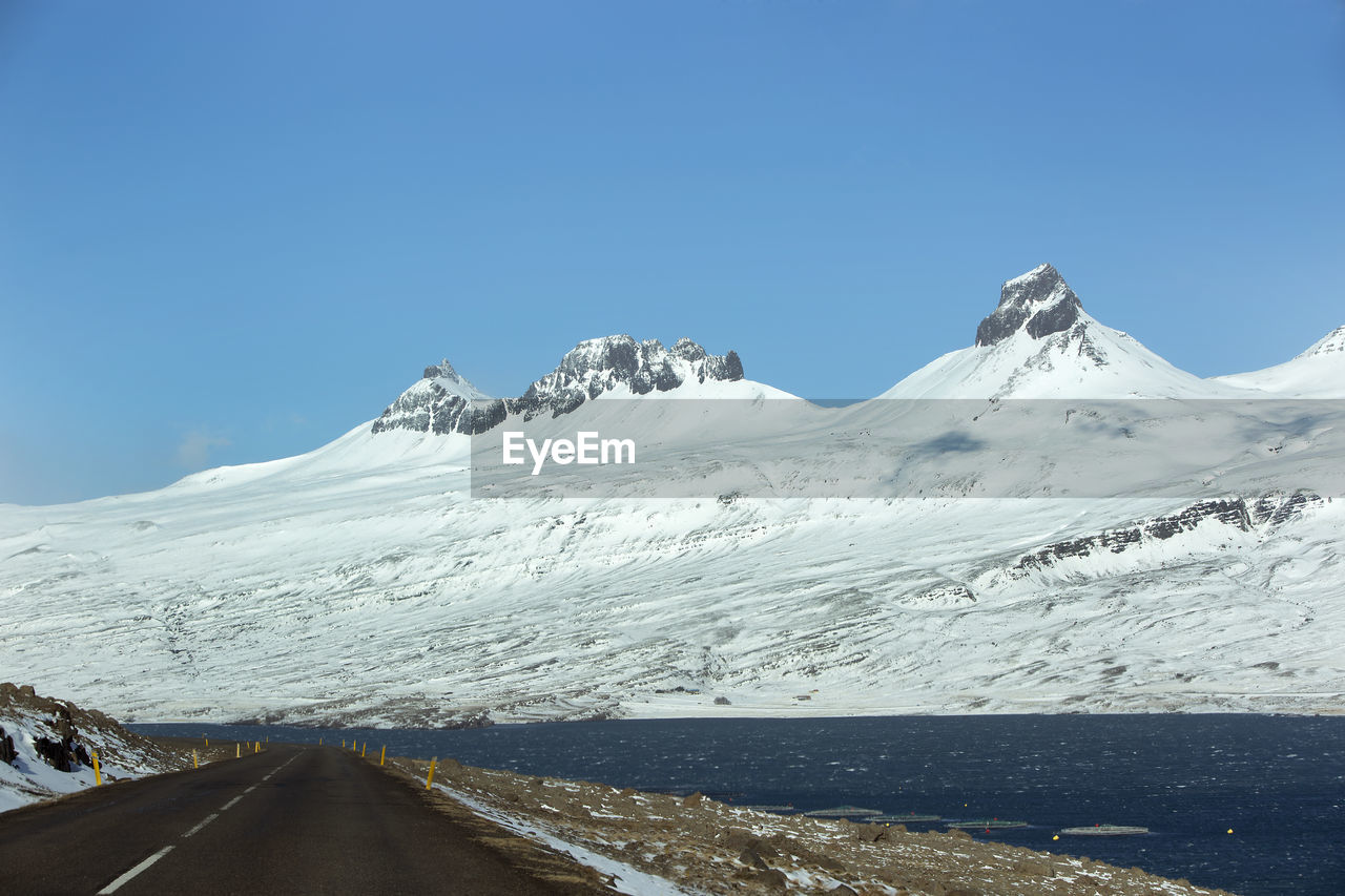 Ring road in iceland in spring with volcano mountain landscape in background
