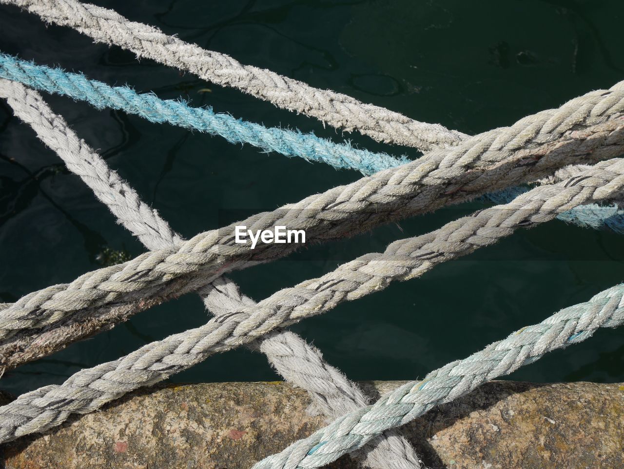 Close-up of rope over sea