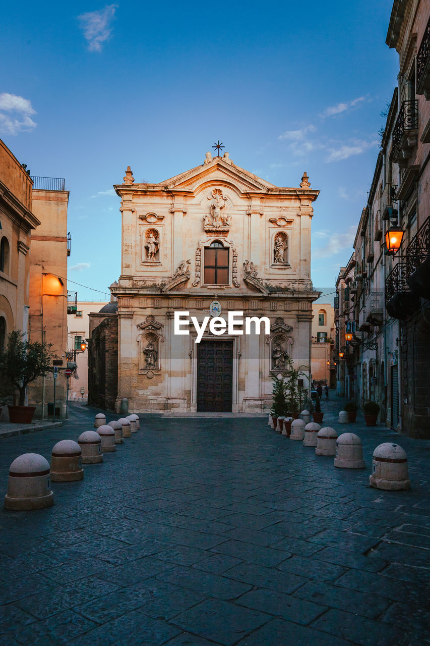 San cataldo cathedral in the old town of taranto at sunrise, vertical