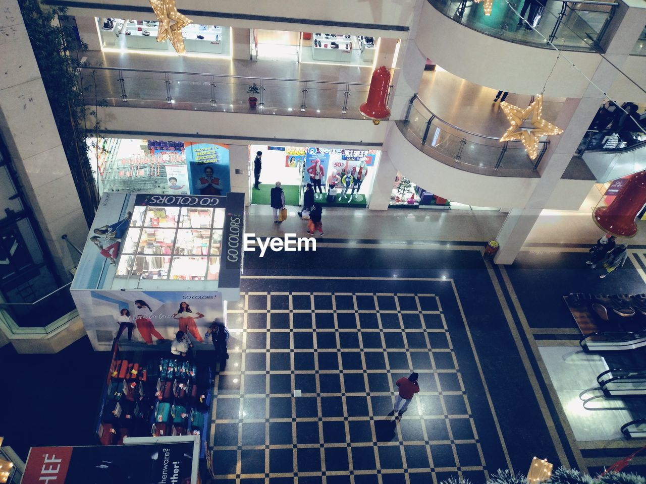 indoors, architecture, store, high angle view, group of people, retail, shopping mall, built structure, technology