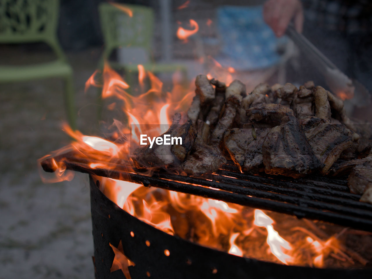 Close-up of fire on barbecue grill