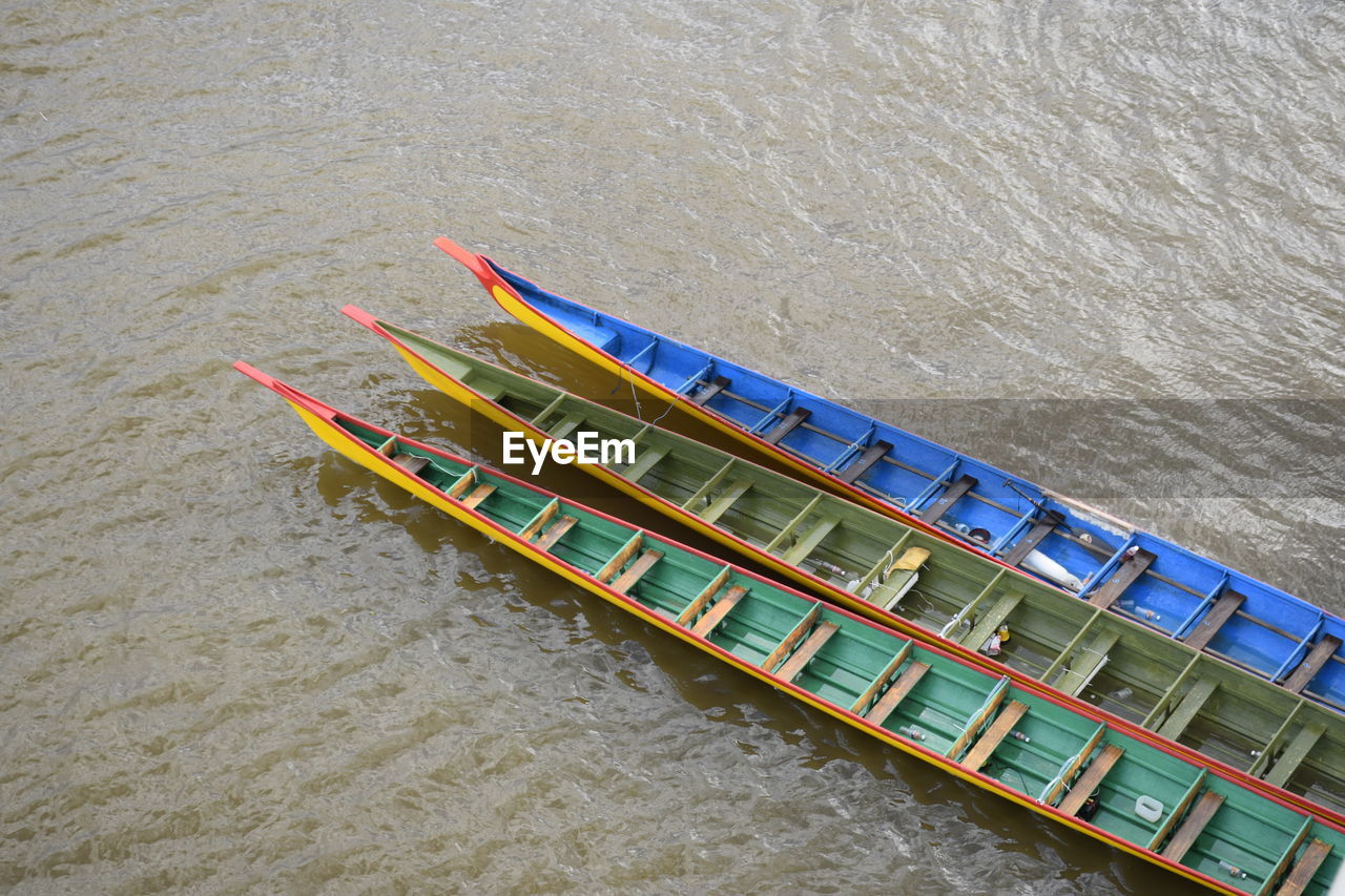 High angle view of boats moored in river