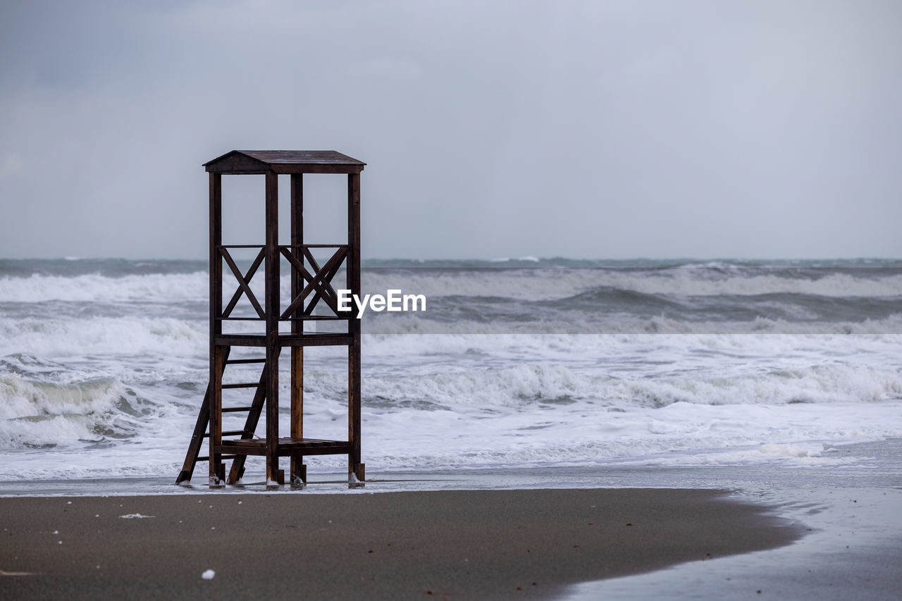 scenic view of beach against clear sky