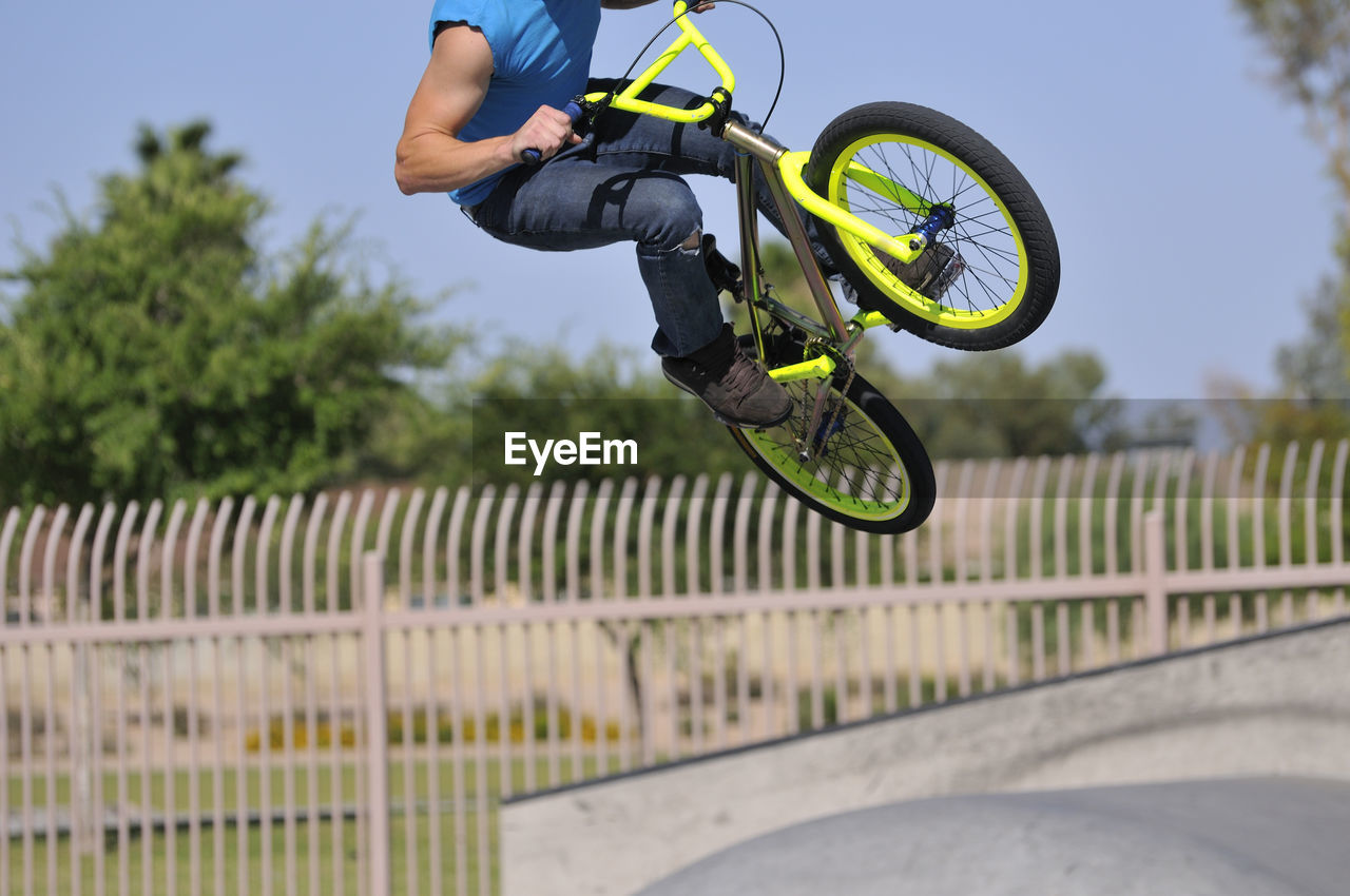 Man performing stunt with bicycle