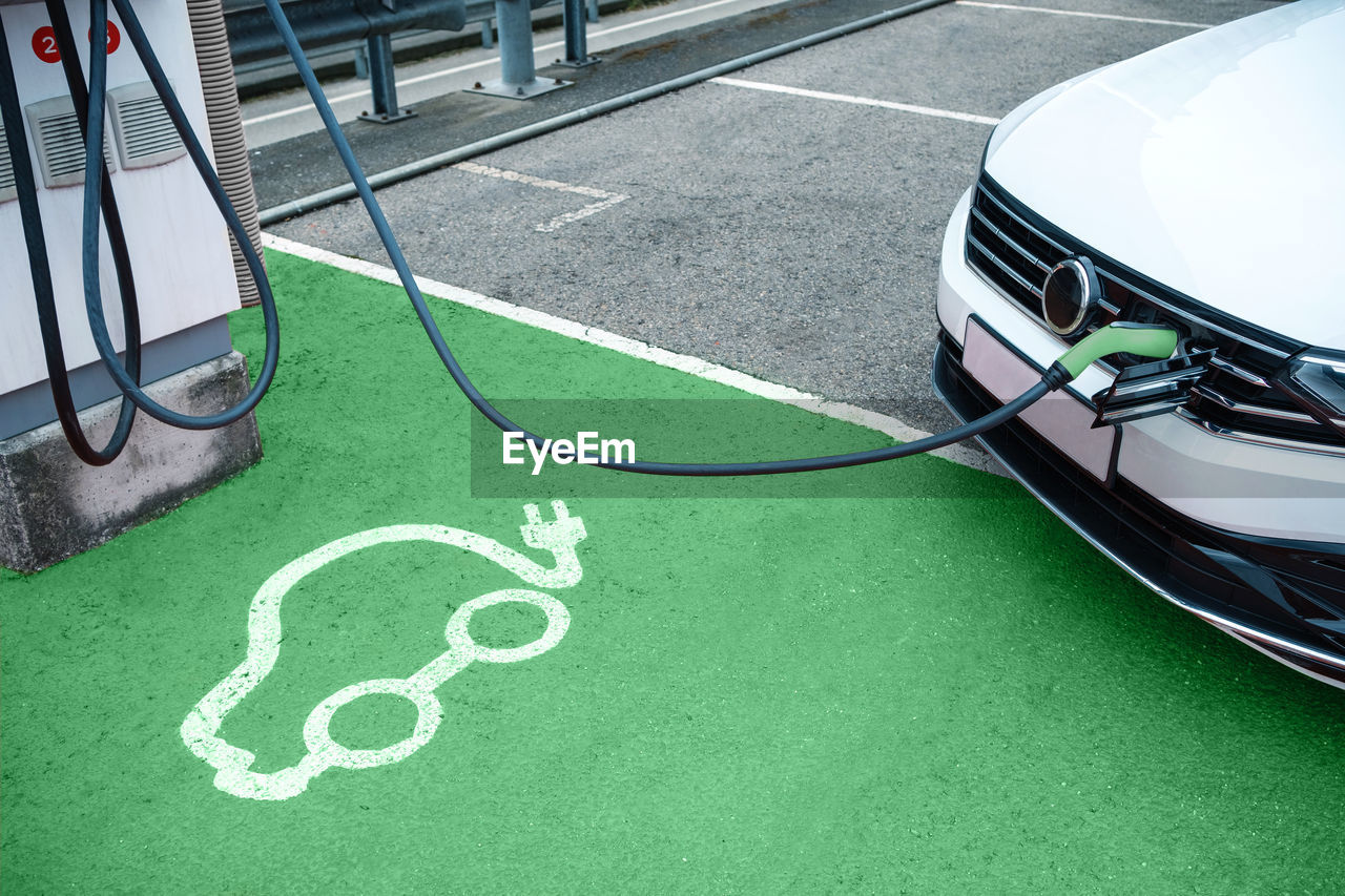 Electric car icon printed on electric vehicle charging station