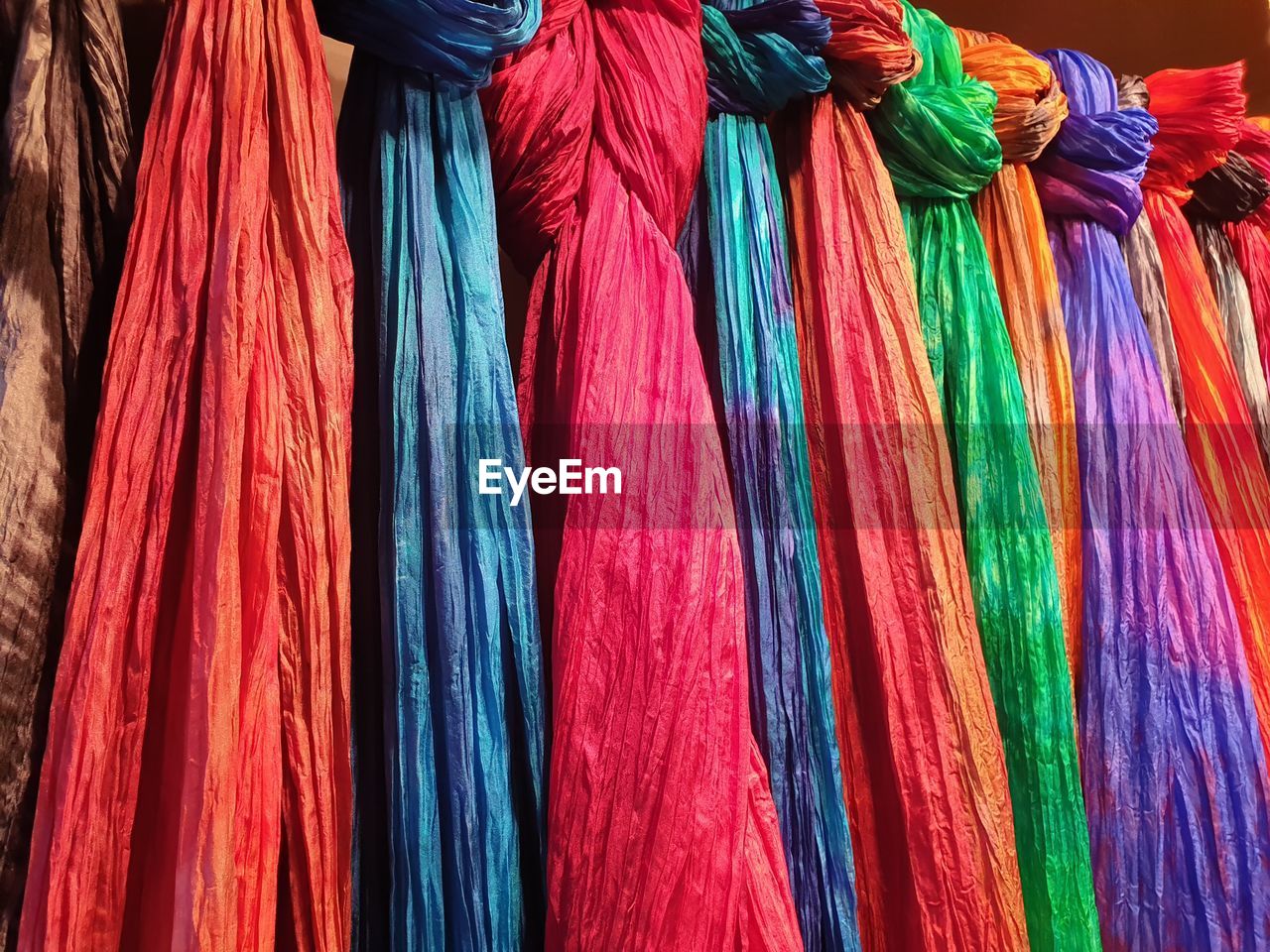 Full frame shot of multi colored textiles hanging at market stall