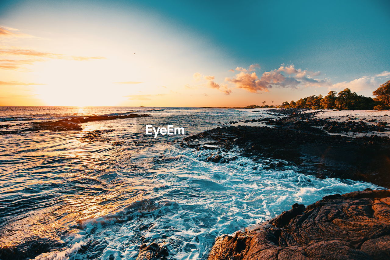 Scenic view of sea against sky during sunset