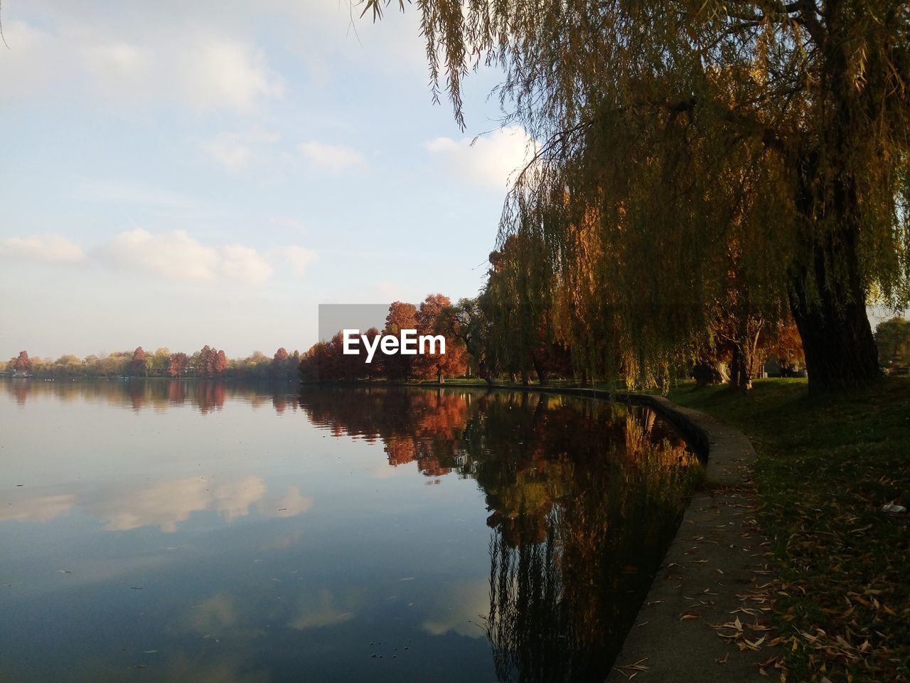 Scenic view of lake against sky during autumn