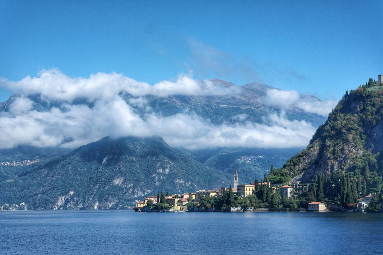 Scenic view of sea against mountain range