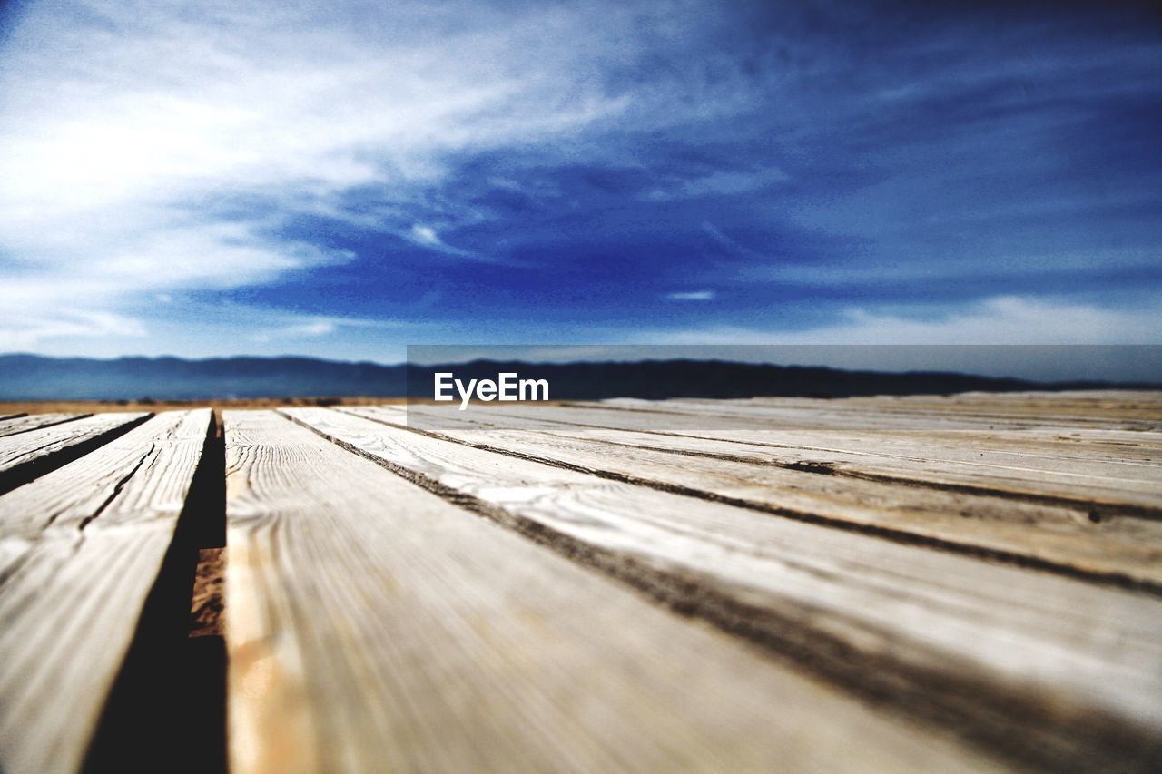 WOODEN PIER ON RIVER