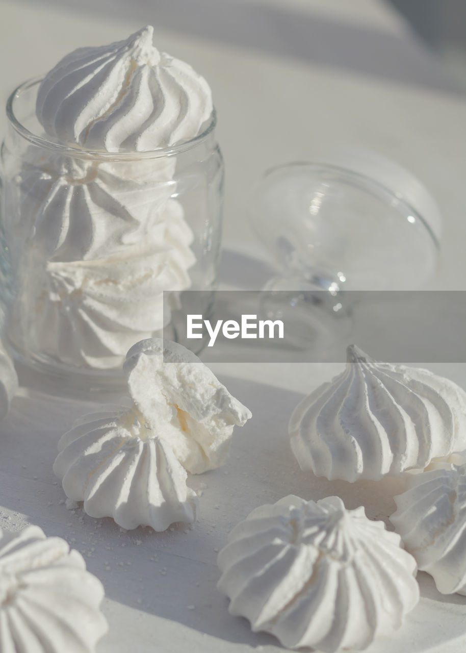 Close-up of white dessert on table