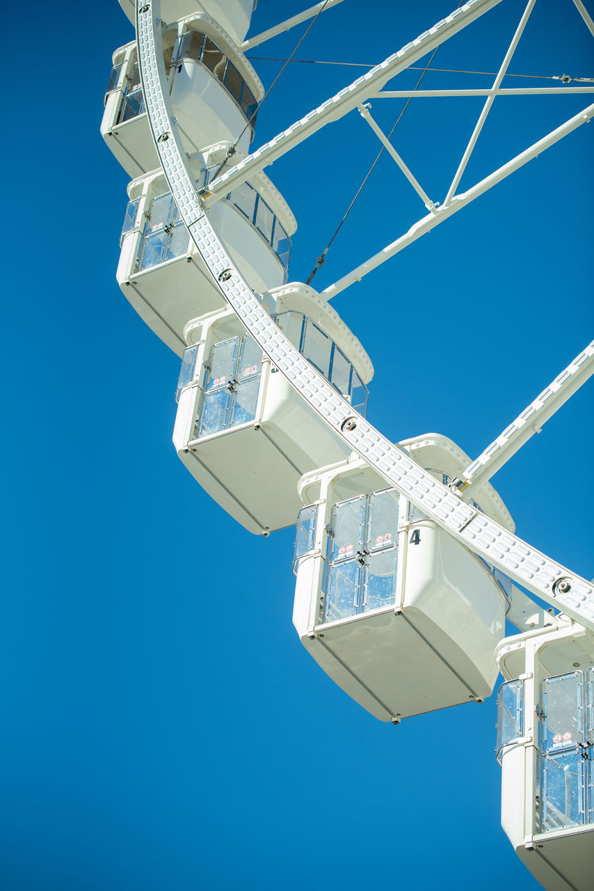 LOW ANGLE VIEW OF FERRIS WHEEL AGAINST SKY