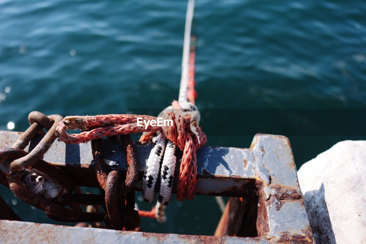 High angle view of rope tied on boat