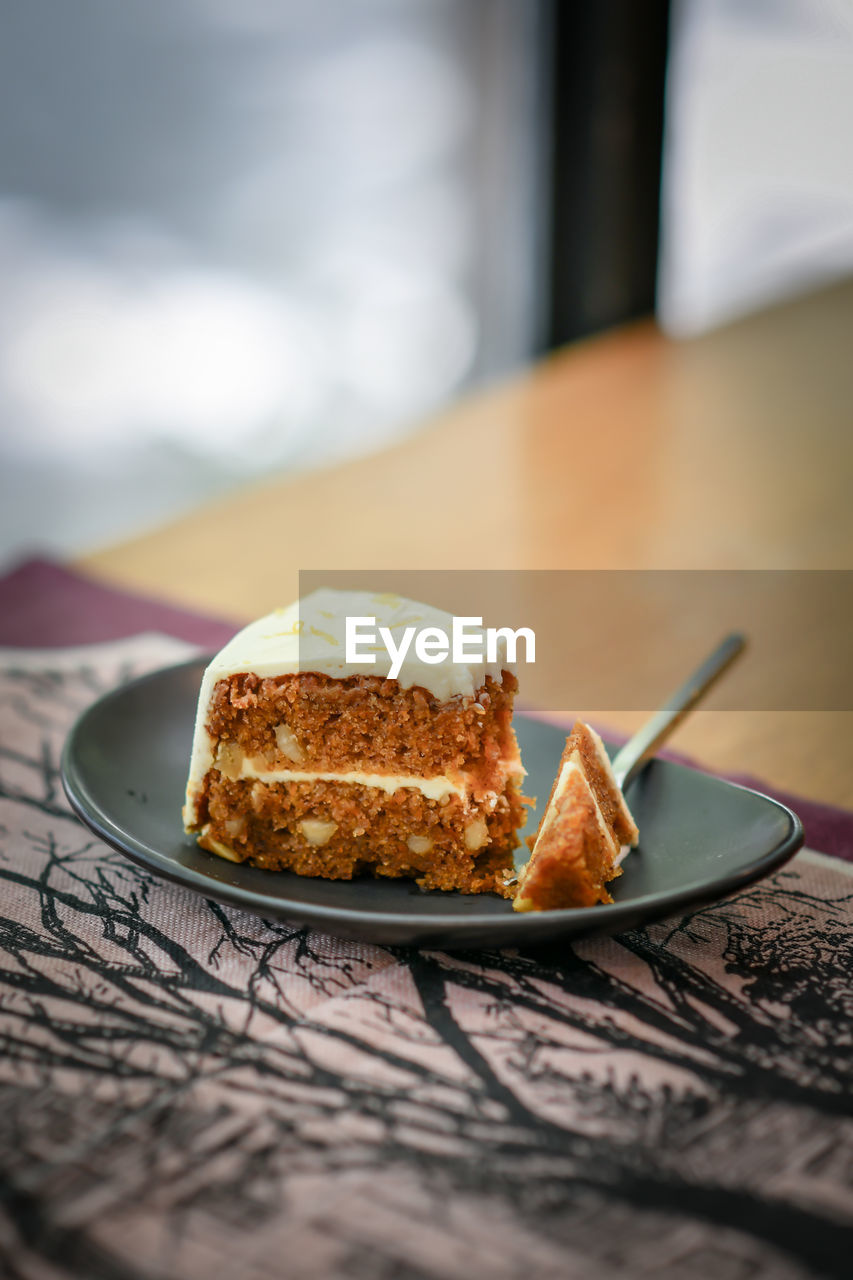 Cake in plate on table