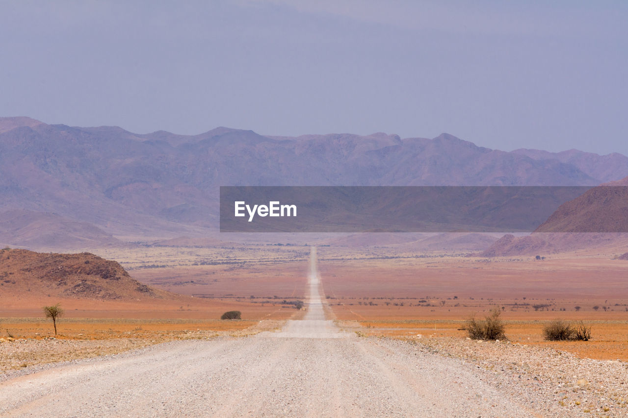 SCENIC VIEW OF DESERT LANDSCAPE AGAINST SKY