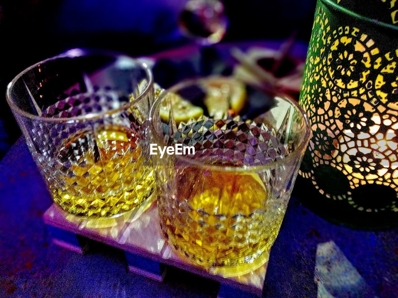 CLOSE UP OF WINE GLASS ON TABLE