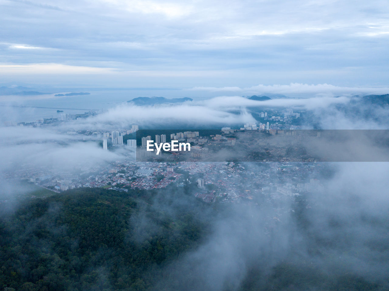 High angle view of smoke emitting from clouds