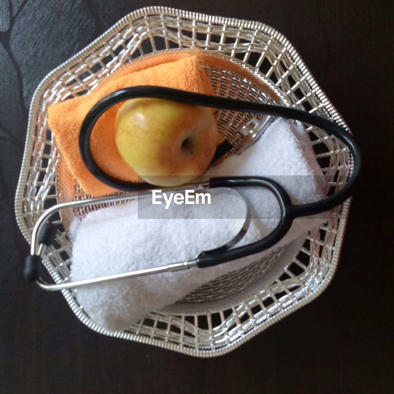 CLOSE-UP OF FRUITS IN BASKET