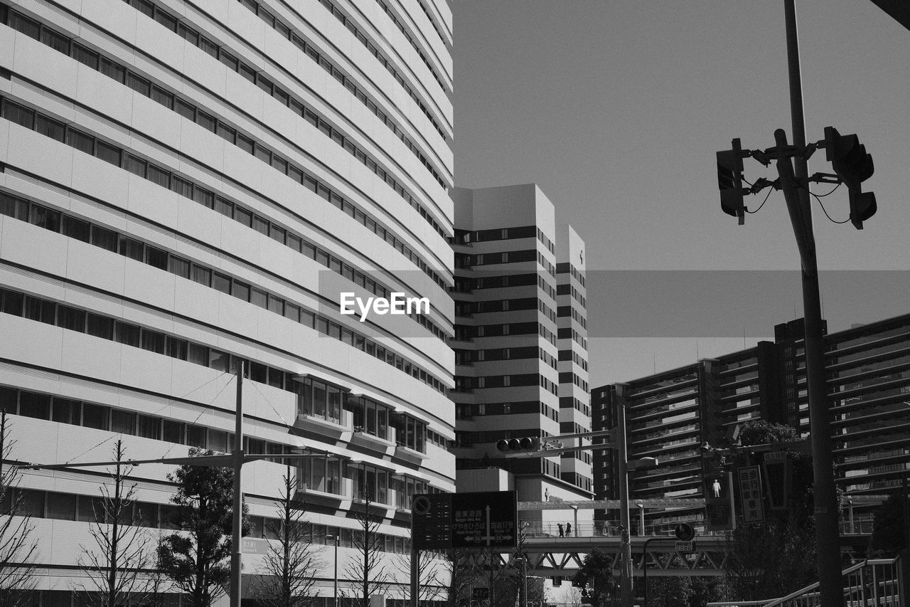 LOW ANGLE VIEW OF BUILDINGS AGAINST SKY