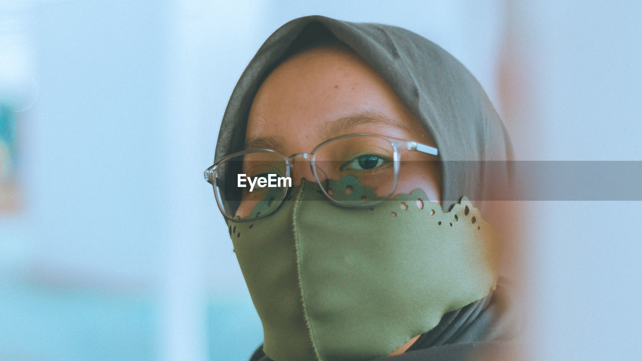 Close-up portrait of young women wearing eyeglasses