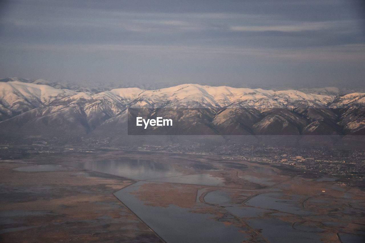 SCENIC VIEW OF SNOWCAPPED MOUNTAIN AGAINST SKY