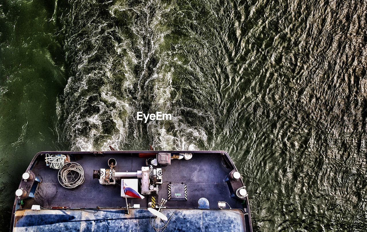 CLOSE-UP OF SHIP ON RIVER