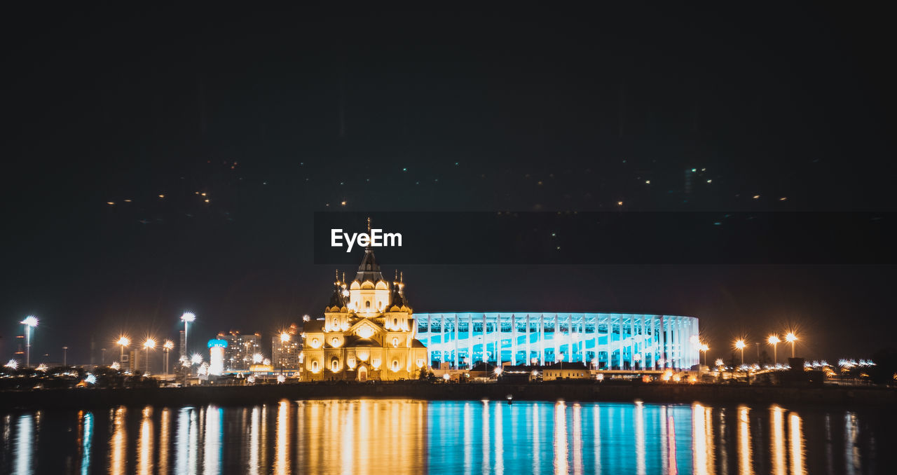 ILLUMINATED BUILDINGS AT NIGHT